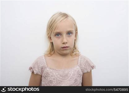 Portrait of girl staring over white background