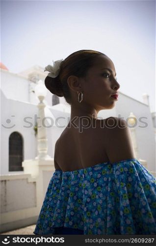 Portrait of girl wearing Plena traditional attire, outdoors