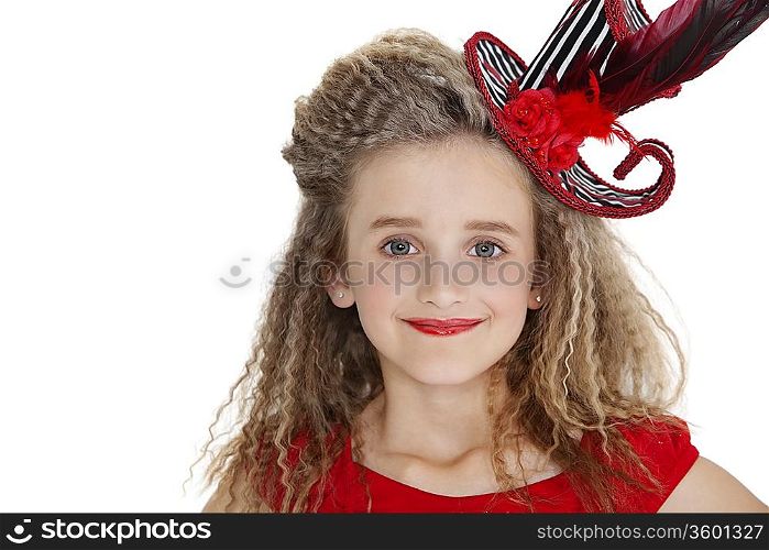 Portrait of girl wearing red lipstick and hat over white background