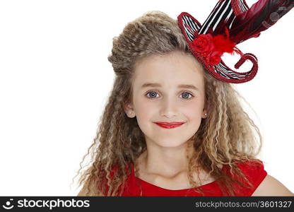 Portrait of girl wearing red lipstick and hat over white background