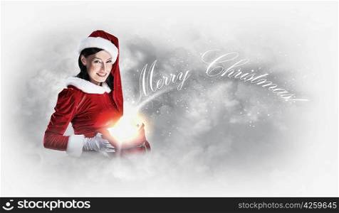 Portrait of girl wearing santa claus clothes