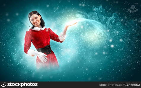 Portrait of girl wearing santa claus clothes. Portrait of beautiful girl wearing santa claus clothes on red background