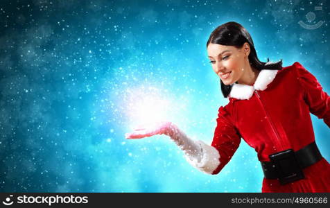 Portrait of girl wearing santa claus clothes. Portrait of beautiful girl wearing santa claus clothes on red background