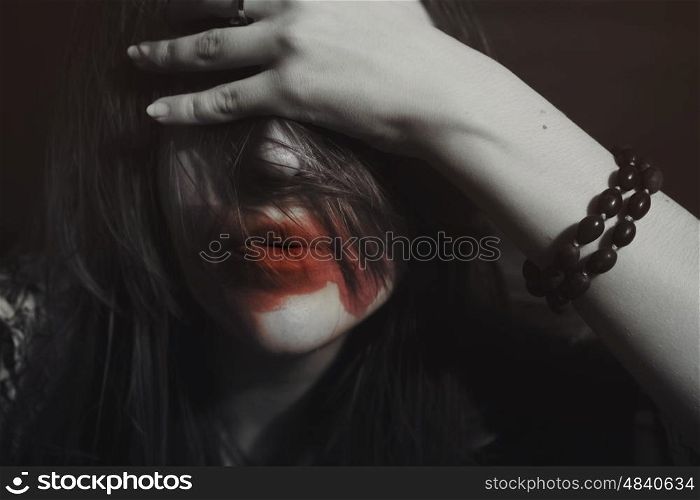 Portrait of girl with closed eyes on black background