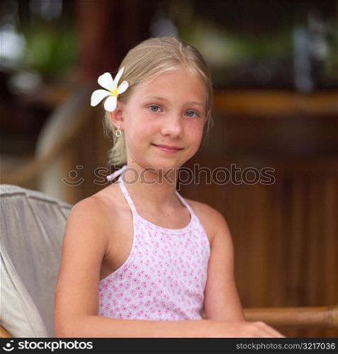 Portrait of Girl with Flower in Her Hair at Moorea in Tahiti