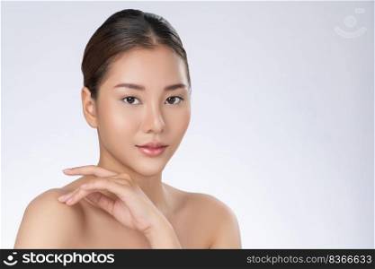 Portrait of gorgeous young girl posing beauty gesture with healthy clear skin and soft makeup. Cosmetology and beauty concept.. Portrait of gorgeous young girl posing beauty gesture with clean fresh skin.