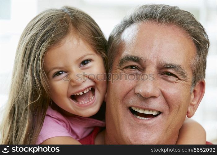 Portrait Of Grandfather With Granddaughter