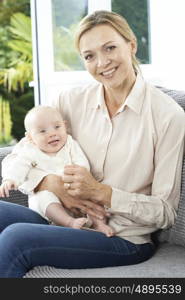 Portrait Of Grandmother With Baby Granddaughter