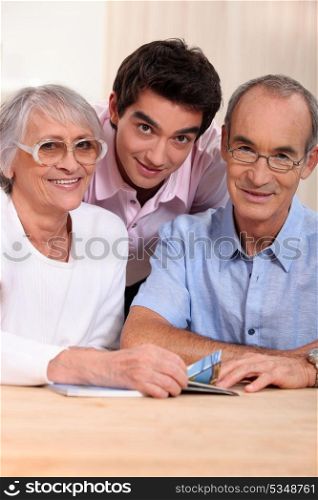 portrait of grandparents with grandson