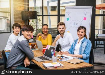 Portrait of Group Of Asian and Multiethnic Business people with casual suit in the modern Office, people business group concept