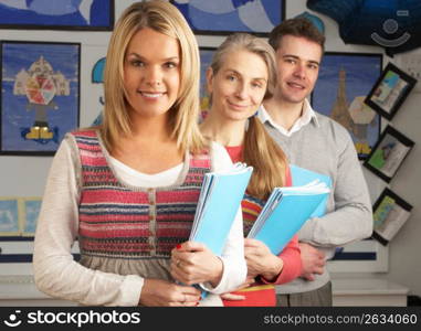 Portrait Of Group Of Teachers In Classroom