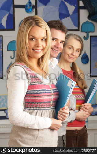 Portrait Of Group Of Teachers In Classroom