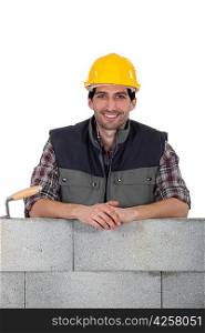 portrait of handsome bricklayer