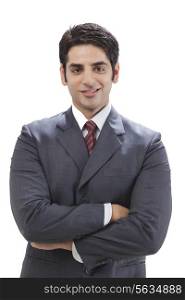 Portrait of handsome businessman smiling on white background