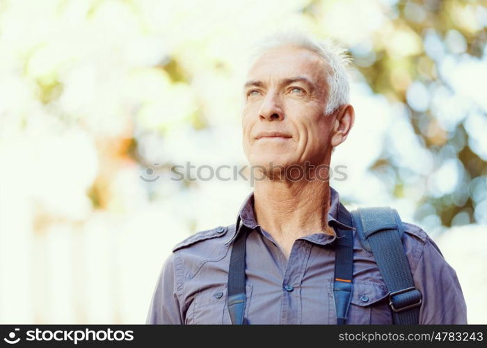 Portrait of handsome man outdoors. Handsome mature man outdoors