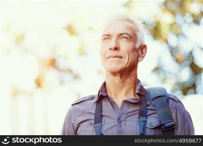 Portrait of handsome man outdoors. Handsome mature man outdoors