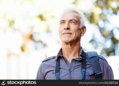 Portrait of handsome man outdoors. Handsome mature man outdoors