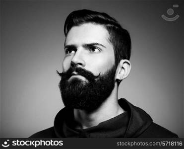 Portrait of handsome man with beard. Close-up. Black and white photo
