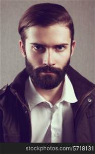 Portrait of handsome man with beard. Fashion photo