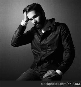 Portrait of handsome man with beard. Fashion photo. Black and white photo