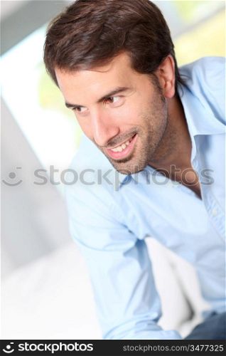 Portrait of handsome man with blue shirt