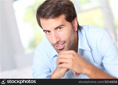 Portrait of handsome man with blue shirt