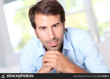 Portrait of handsome man with blue shirt