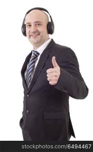 Portrait of handsome man with headphones smiling going thumb up on good music isolated on white. music