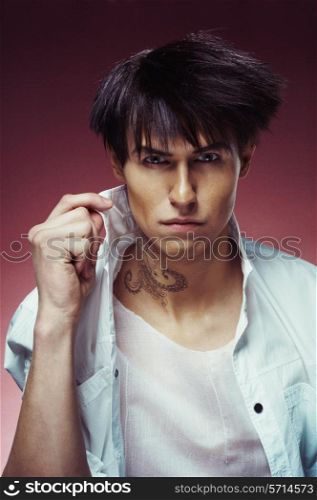 Portrait of handsome man with stylish haircut