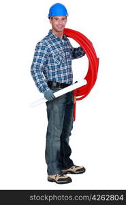 portrait of handsome plumber carrying red hose isolated on white