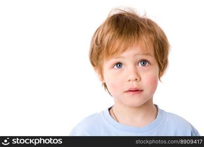 Portrait of handsome redhead boy with blue eyes isolated on white