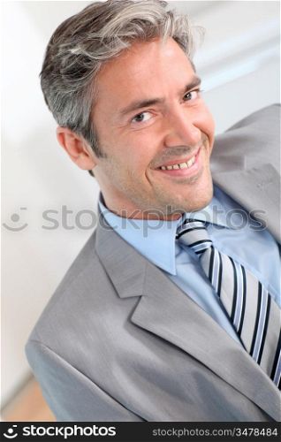 Portrait of handsome smiling businessman