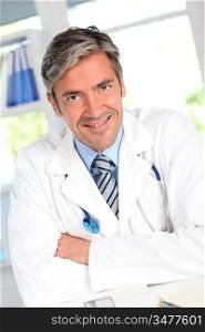 Portrait of handsome smiling doctor