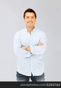 portrait of handsome smiling man in casual shirt