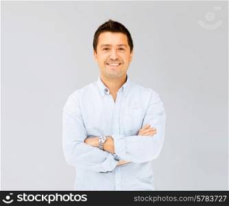 portrait of handsome smiling man in casual shirt