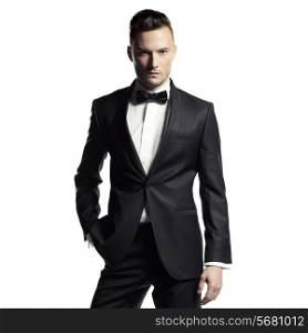 Portrait of handsome stylish man in elegant black suit
