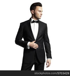 Portrait of handsome stylish man in elegant black suit