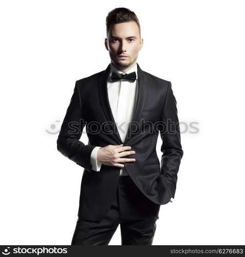 Portrait of handsome stylish man in elegant black suit