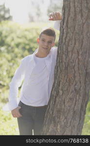 Portrait of Handsome teenage boy outdoors