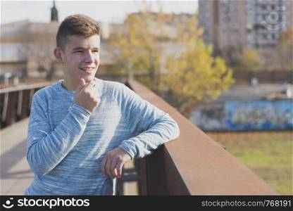 Portrait of Handsome teenage boy outdoors