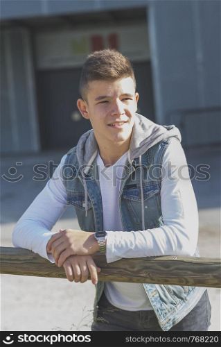 Portrait of Handsome teenage boy outdoors