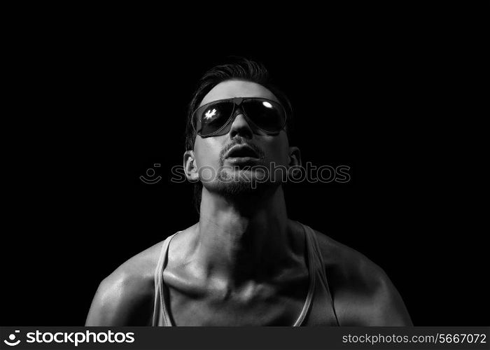Portrait of handsome young man in sunglasses