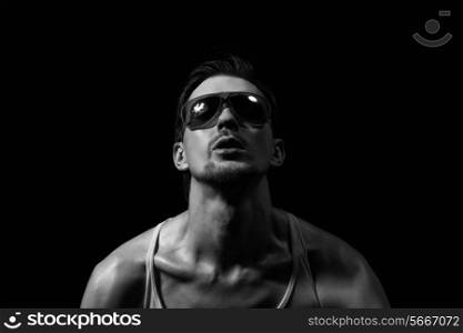 Portrait of handsome young man in sunglasses