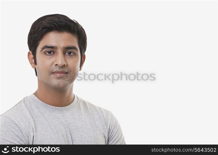 Portrait of handsome young man over white background