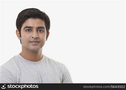 Portrait of handsome young man over white background