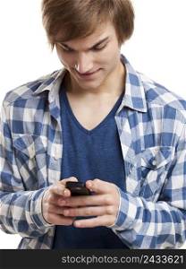 Portrait of handsome young man sending text messages with is mobile phone, isolated on white background