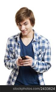 Portrait of handsome young man sending text messages with is mobile phone, isolated on white background