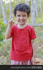Portrait of happy Asian little boy outdoor