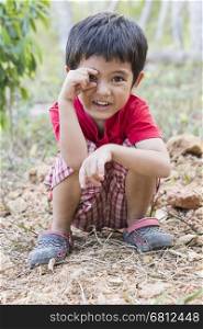 Portrait of happy Asian little boy smile outdoor