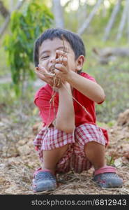 Portrait of happy Asian little boy smile outdoor